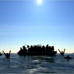 Migranti su un gommone